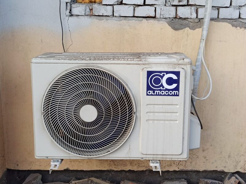 Outdoor air conditioner condenser fan close up
